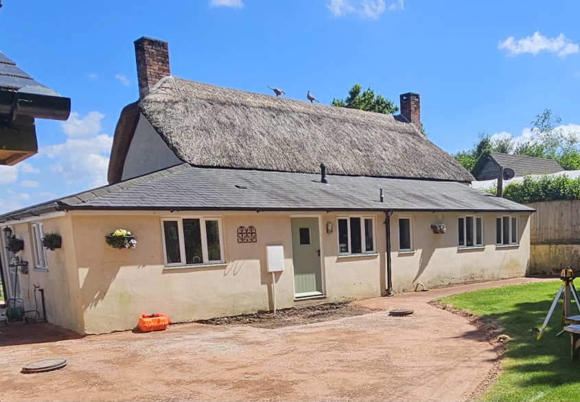 The property before work began, showing the entrance without a porch